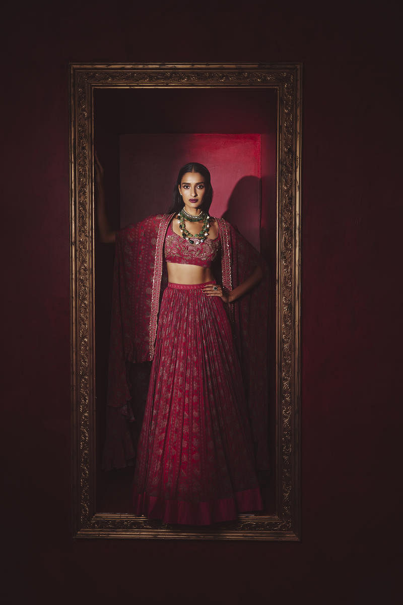 A lehenga choli by fashion designer Ridhi Mehra. From wrap knit dresses to co-ord sets, there are many designs to choose in magenta. Credit: Special Arrangement