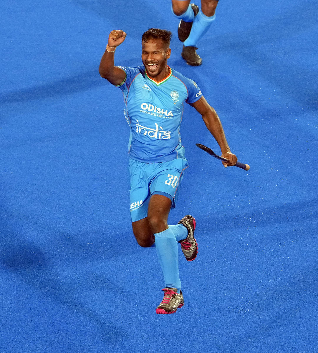 Hardik Singh (left) celebrates with team-mate Manpreet Singh after scoring India’s second goal against Spain in FIH Hockey Men’s World Cup in Rourkela on Friday. (RIGHT) Amit Rohidas scored the opening goal. PTI