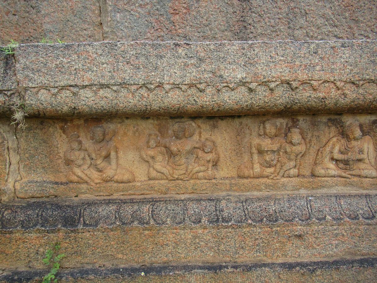 Carvings of mythological characters near the Kamala tirtha.