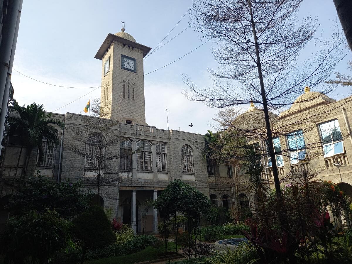 The entrance of the BBMP building, featuring a clock tower.