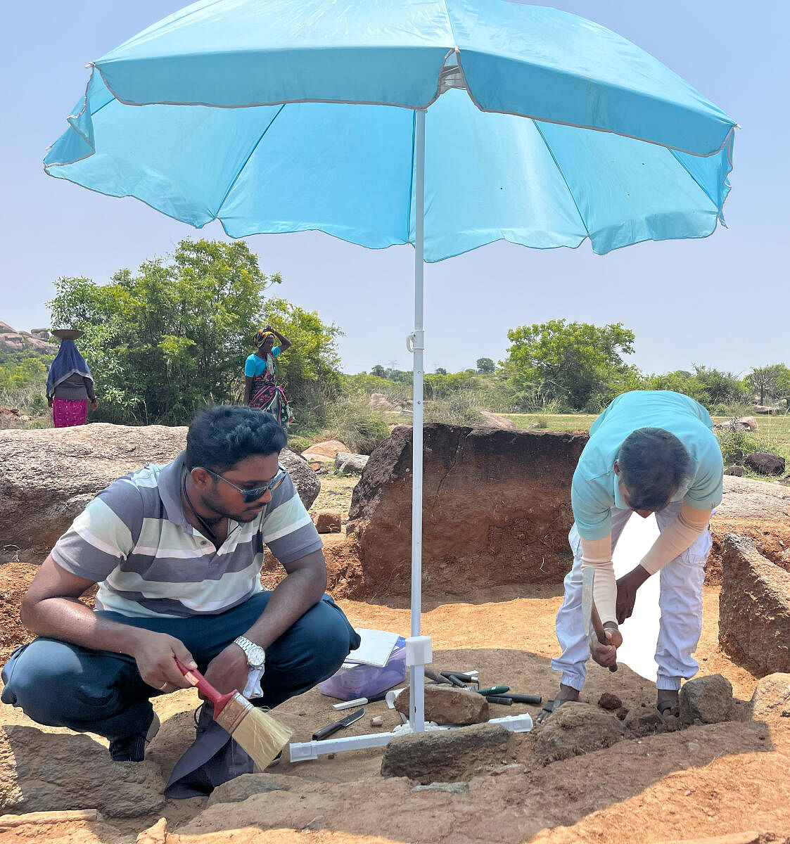Above: A stone circle at Kilnamandi, TN. Below: Marking the north-south-east-west orientation of a site is the first step in excavations. Then labourers start digging. Once artefacts or materials surface, experts scrape and recover them gently. The team was able to expose a sarcophagus — a coffin with customary offering pots. Credit: ETB SIVAPRIYAN