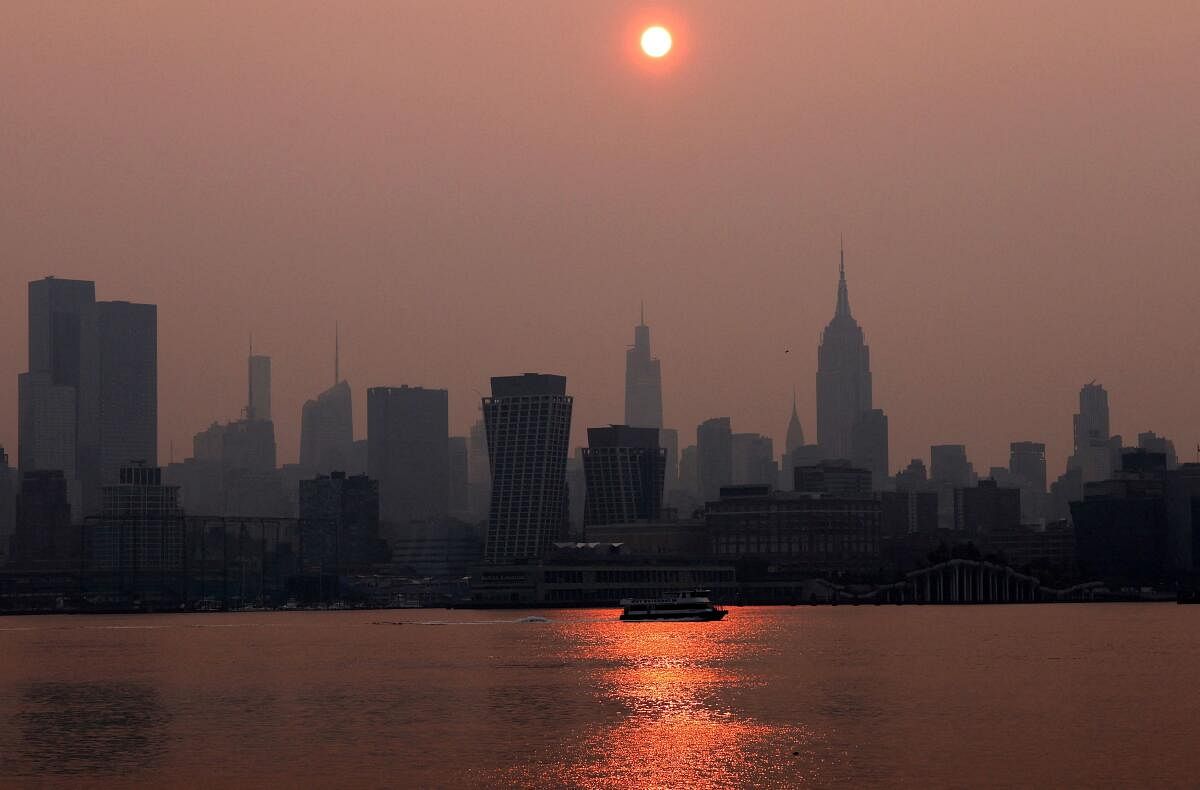 Haze and smoke from Canadian wildfires shroud Manhattan skyline in New York. Credit: Reuters Photo