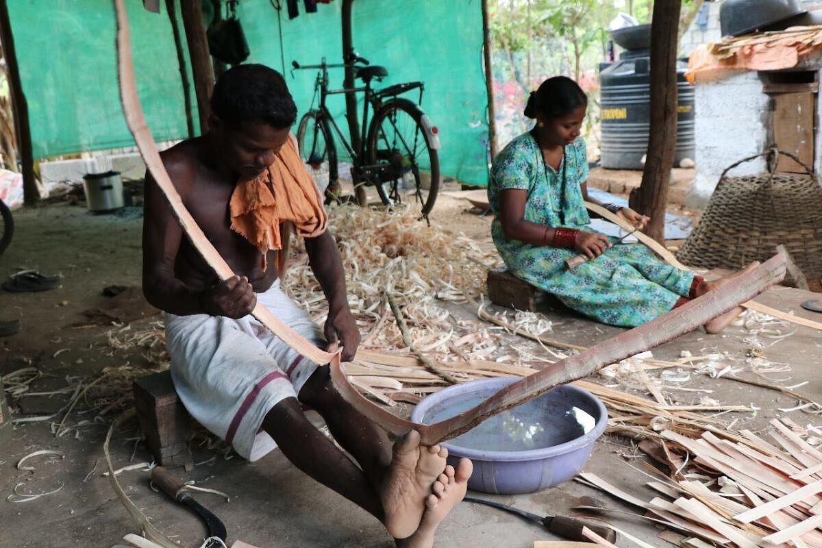 Babu and Ammi weaving baskets. Photos by author