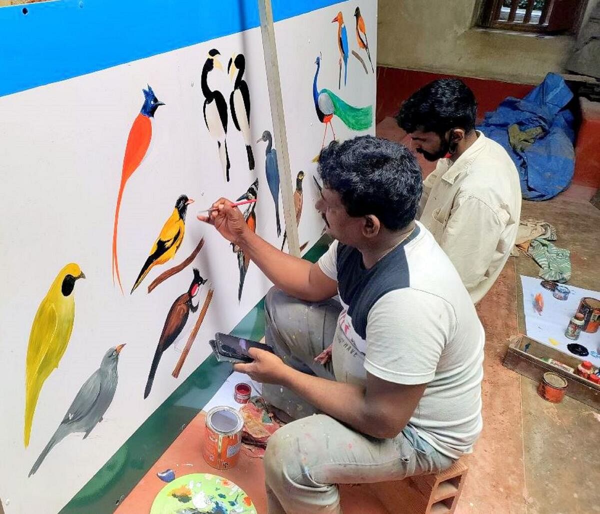 Artists at work in the Bhaasa Gallery.