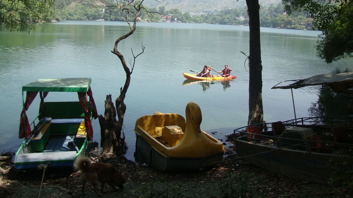 Spend time by the peaceful Naukuchiatal Lake named after nine corners of this lake. Photo by author