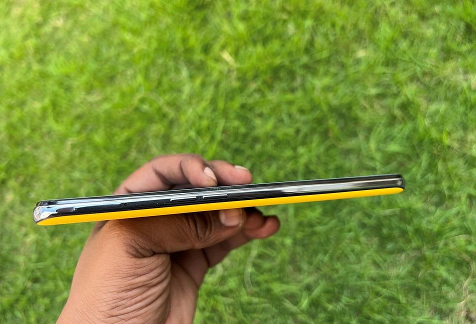 Realme GT 5G left side view with volume rockers and SIM tray. Credit: DH Photo/KVN Rohit