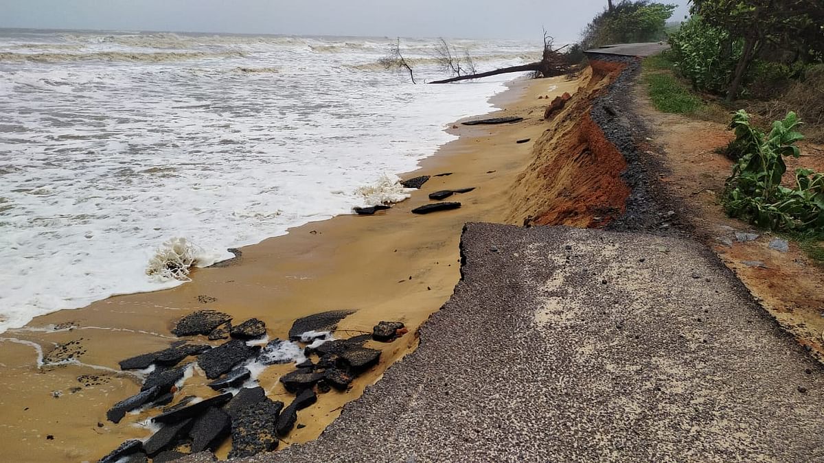 The road from Surathkal Light House to NITK beach has been cut following rough waves. Credit: DH Photo/Govindraj Javali