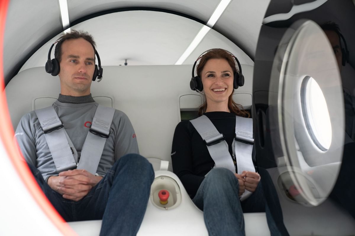 Virgin’s Chief Technology Officer Josh Giegel and Director of Passenger Experience, Sara Luchian reached speeds of up to 107 miles per hour (172 kmph). Manjrekar, Virgin’s Power Electronics Specialist is next in line. Credit: Special Arrangement