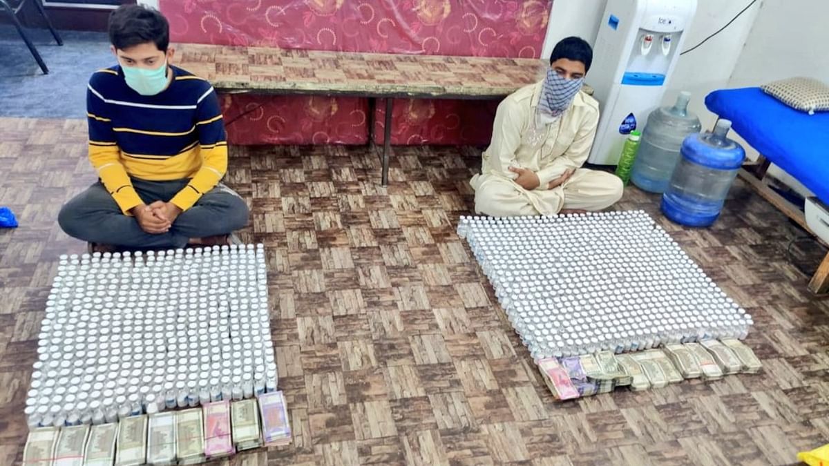 Police seized over 60,000 empty vials, 30,000 fake stickers and over Rs 90 lakh cash.