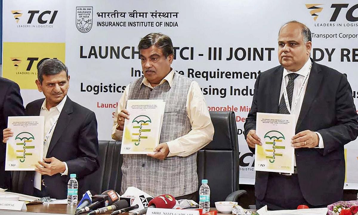 Union Minister for Road Transport & Highways, Shipping, Nitin Gadkari launching the Joint study report on “Insurance Requirements of the Indian Logistics & Warehousing Industry and their Customers” by the Transport Corporation of India Ltd. and Insurance Institute of India, in New Delhi on Tuesday. PTI Photo / PIB