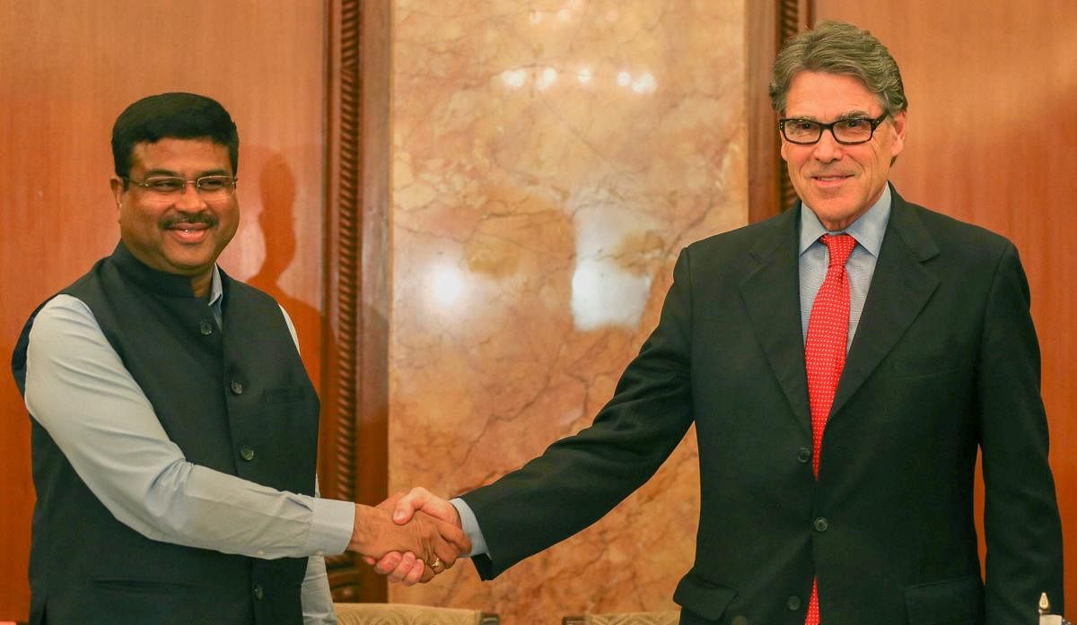 Union Minister for Petroleum & Natural Gas and Skill Development & Entrepreneurship, Dharmendra Pradhan along with the Secretary of Energy, US, Rick Perry before briefing the media on Indo-US Energy relations, in New Delhi on Tuesday. PTI