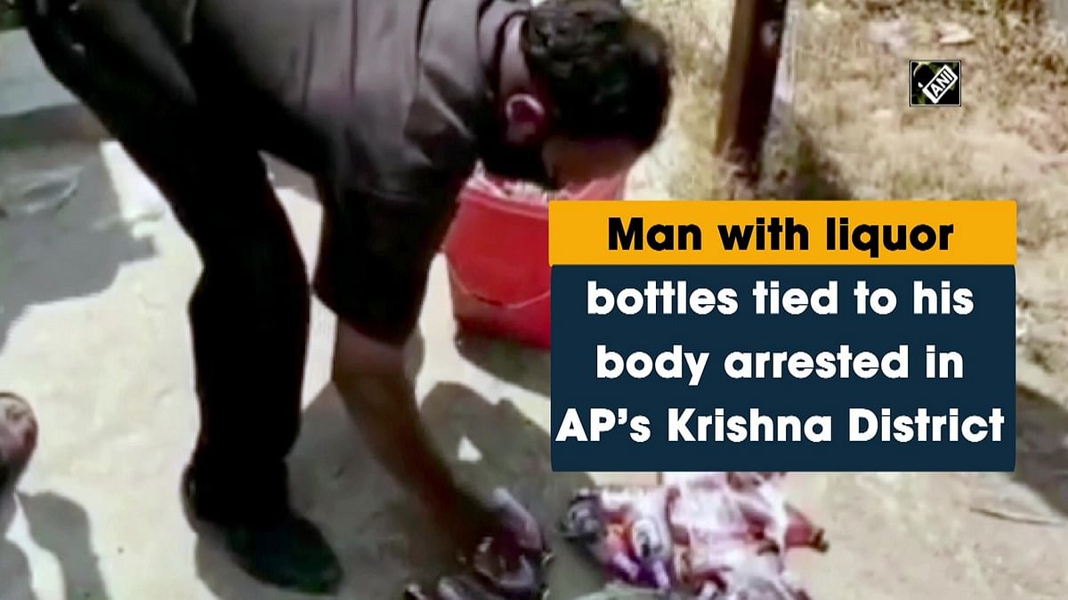 Andhra: Man with liquor bottles tied to his body held