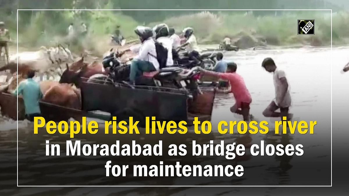 People risk lives to cross river in UP