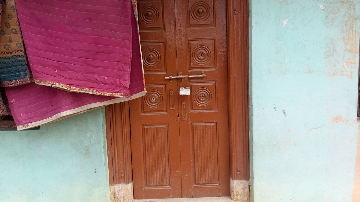 Locked and sealed doors in Ganesh Nagar and Patha Gutta.