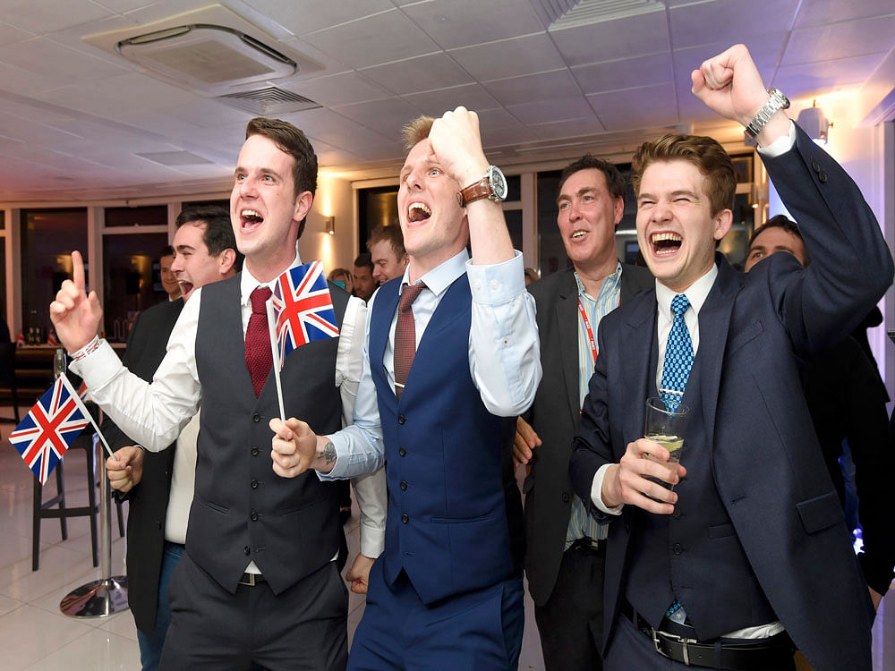 Leave supporters react as results of the EU referendum are announced at a results party in London. Reuters