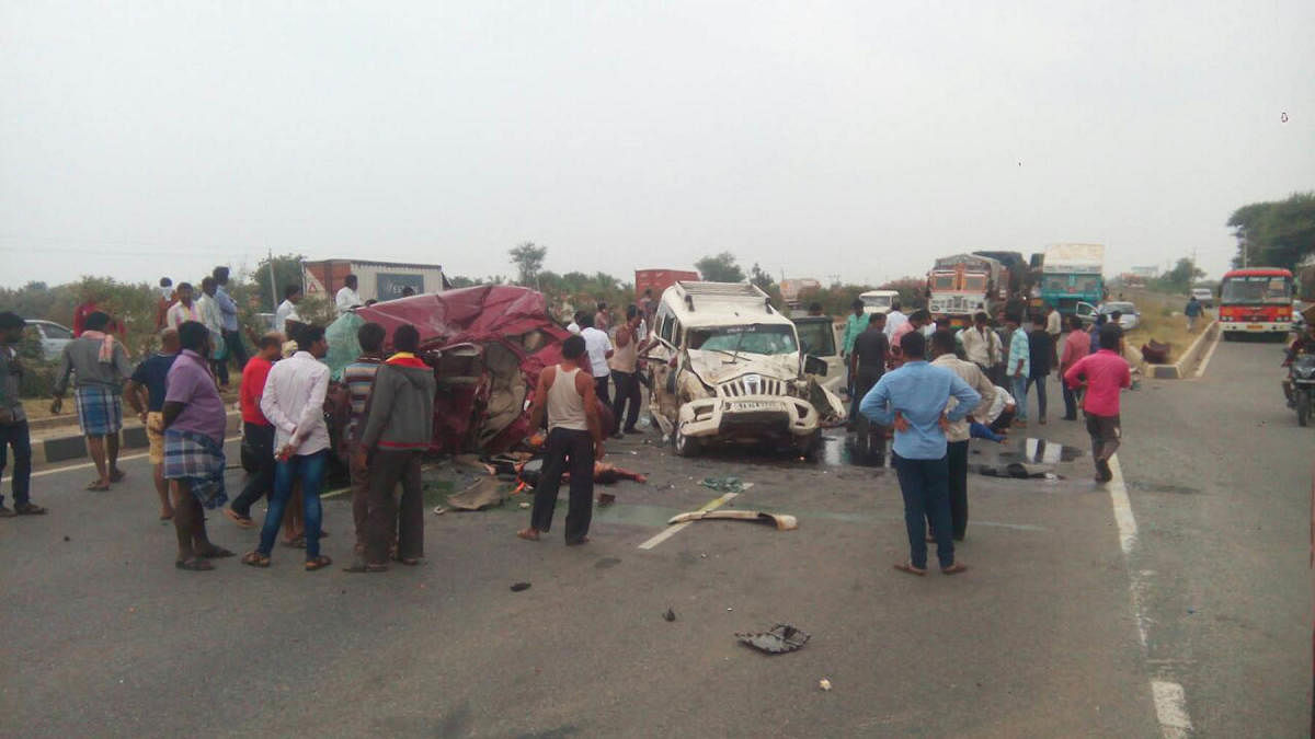 The severely damaged Suzuki Ertiga and Scorpio vehicles after they collided head-on near Chitradurga on Saturday. dh photo