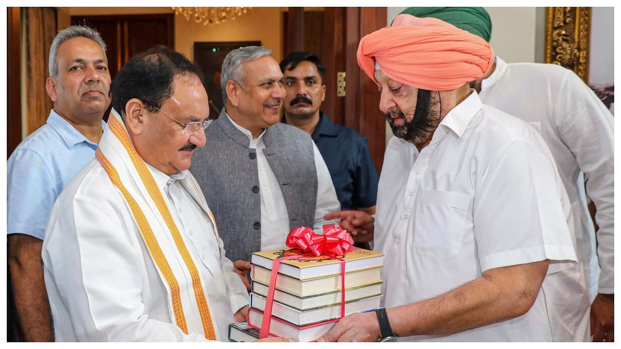 BJP National President JP Nadda meets party leader and former Punjab chief minister Amarinder Singh, in Mohali, Thursday, June 15, 2023. Credit: PTI Photo