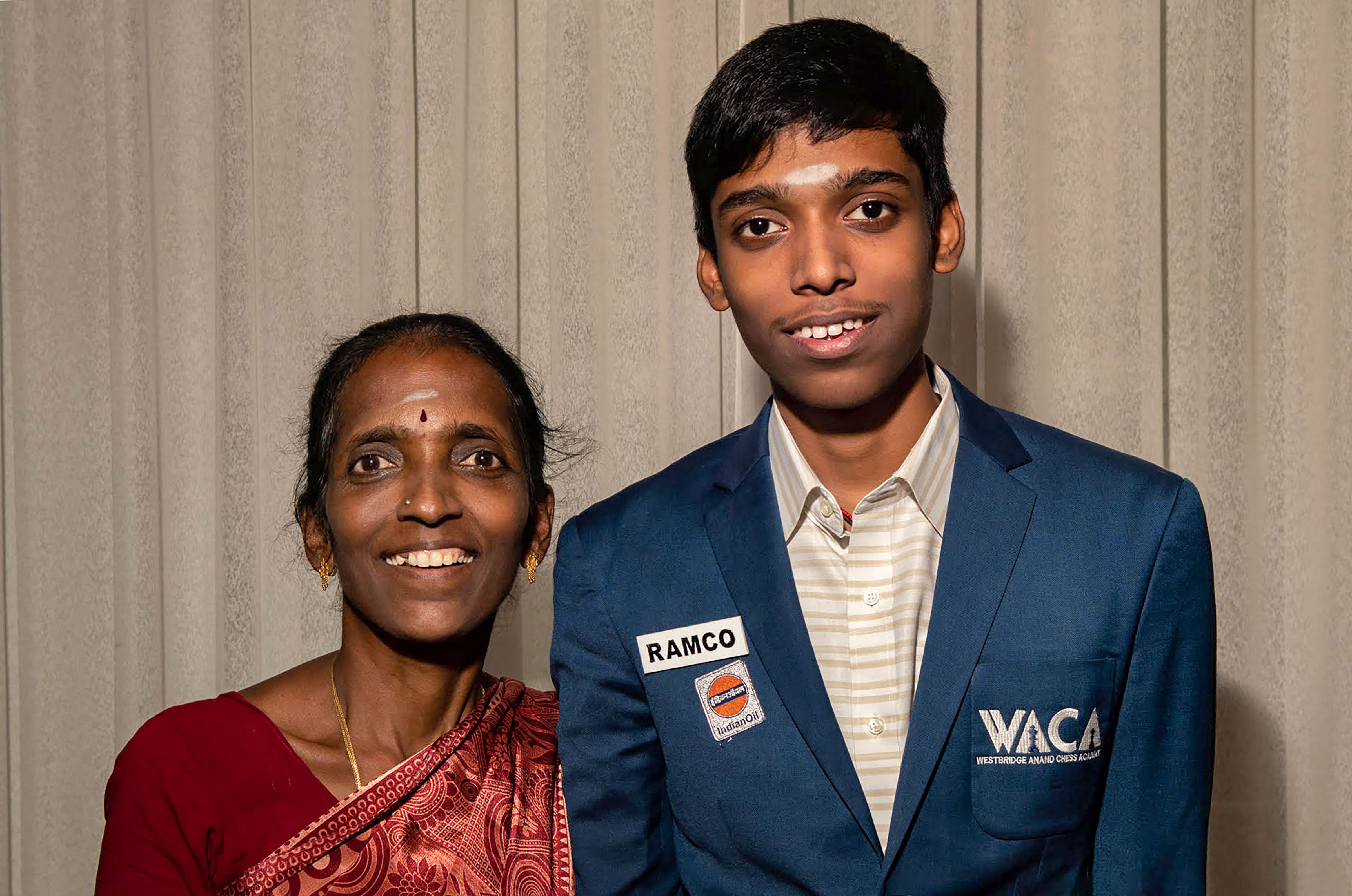 <div class="paragraphs"><p> Indian Chess GM R Praggnanandhaa with his mother Nagalakshmi. </p></div>