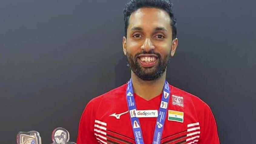 <div class="paragraphs"><p>India's badminton player Prannoy HS poses for photos after winning the bronze medal in the men's singles event at the BWF World Championship, in Copenhagen, Denmark, Sunday, Aug. 27, 2023.</p></div>