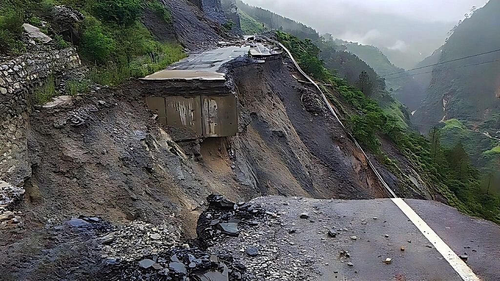 <div class="paragraphs"><p> A section of a road on the Badrinath National Highway near Bhanerpani Pipalkoti washed away following heavy rainfall, in Chamoli district.</p></div>