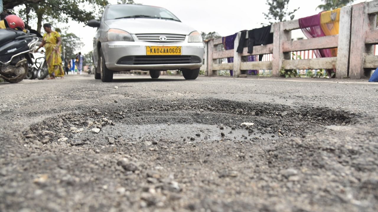 <div class="paragraphs"><p>Potholes in streets of Bengaluru.</p></div>