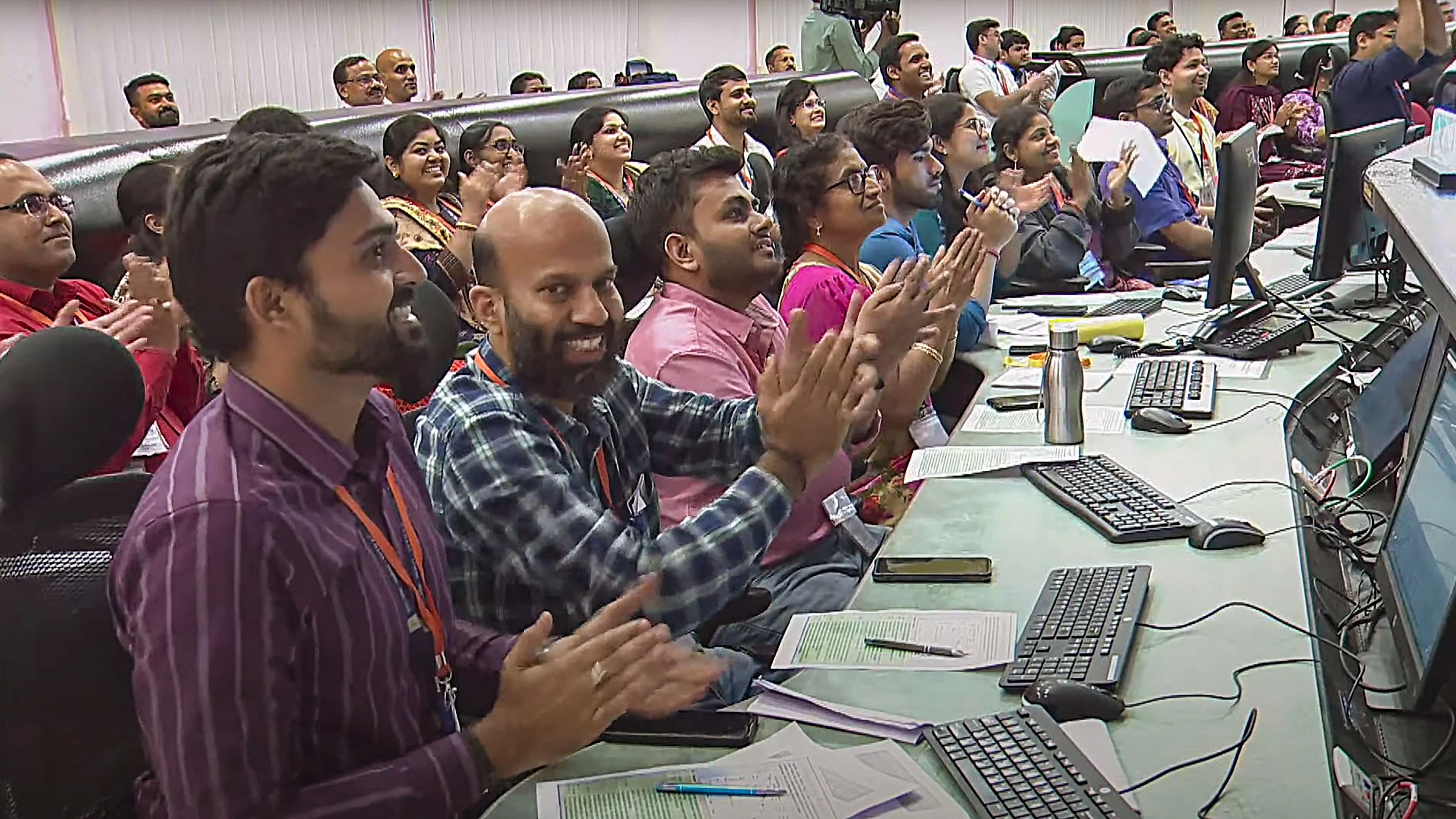 <div class="paragraphs"><p>ISRO scientists clap during the final phase of Chandrayaan-3's landing on the Moons surface, at the ISRO headquarters</p></div>