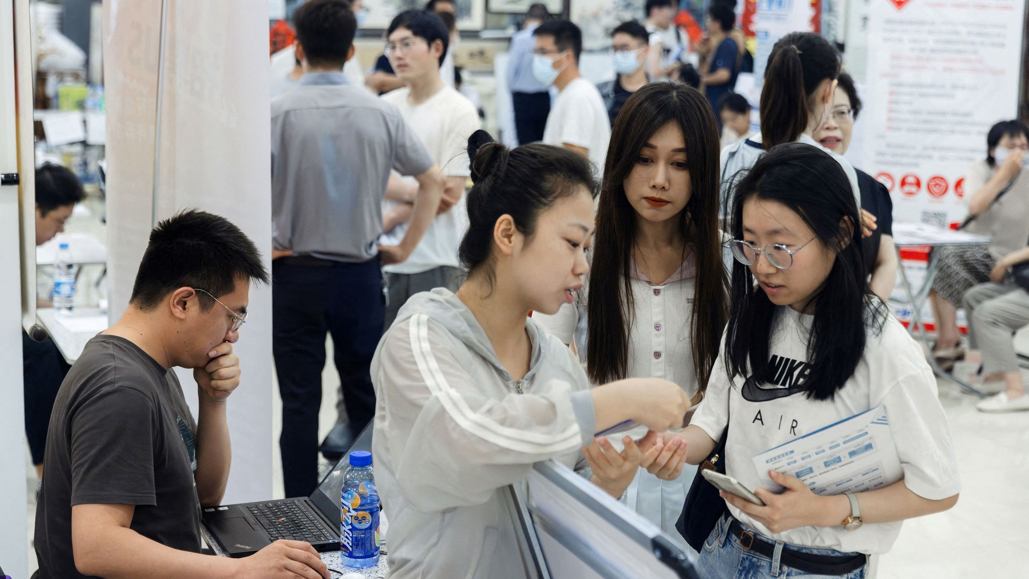 <div class="paragraphs"><p>People attend a job fair in a mall in Beijing, China June 30, 2023.</p></div>