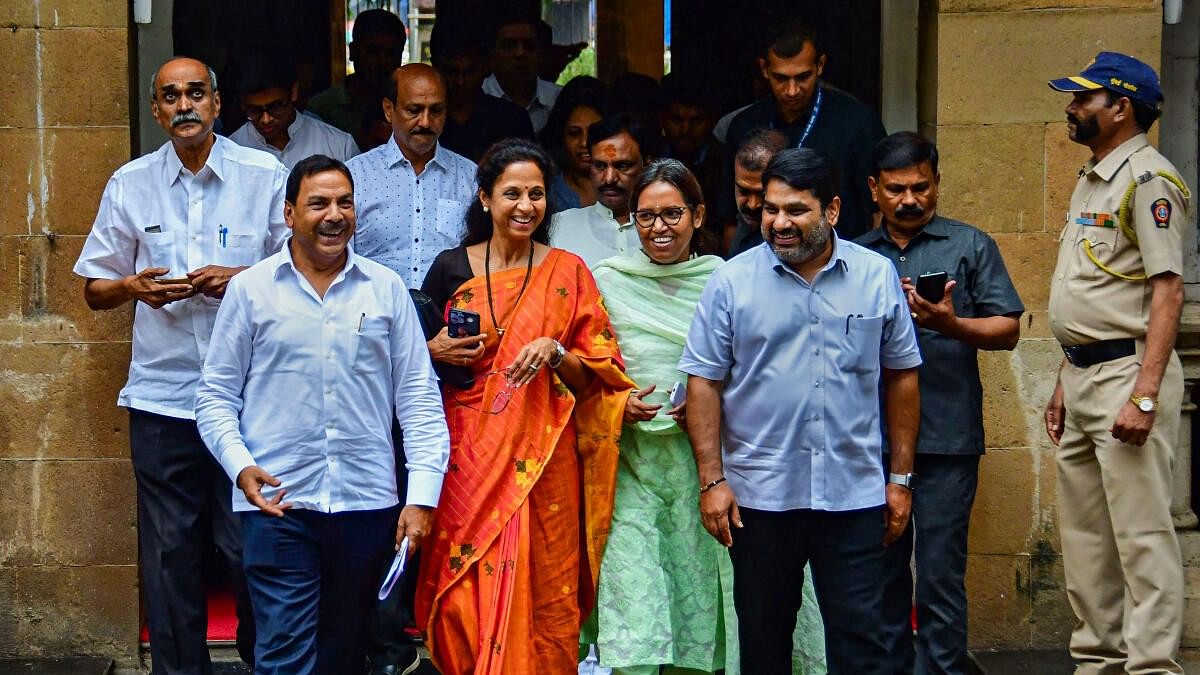 <div class="paragraphs"><p>NCP MP Supriya Sule and other Maha Vikas Aghadi (MVA) leaders leave after meeting with Mumbai Police Commissioner.</p></div>