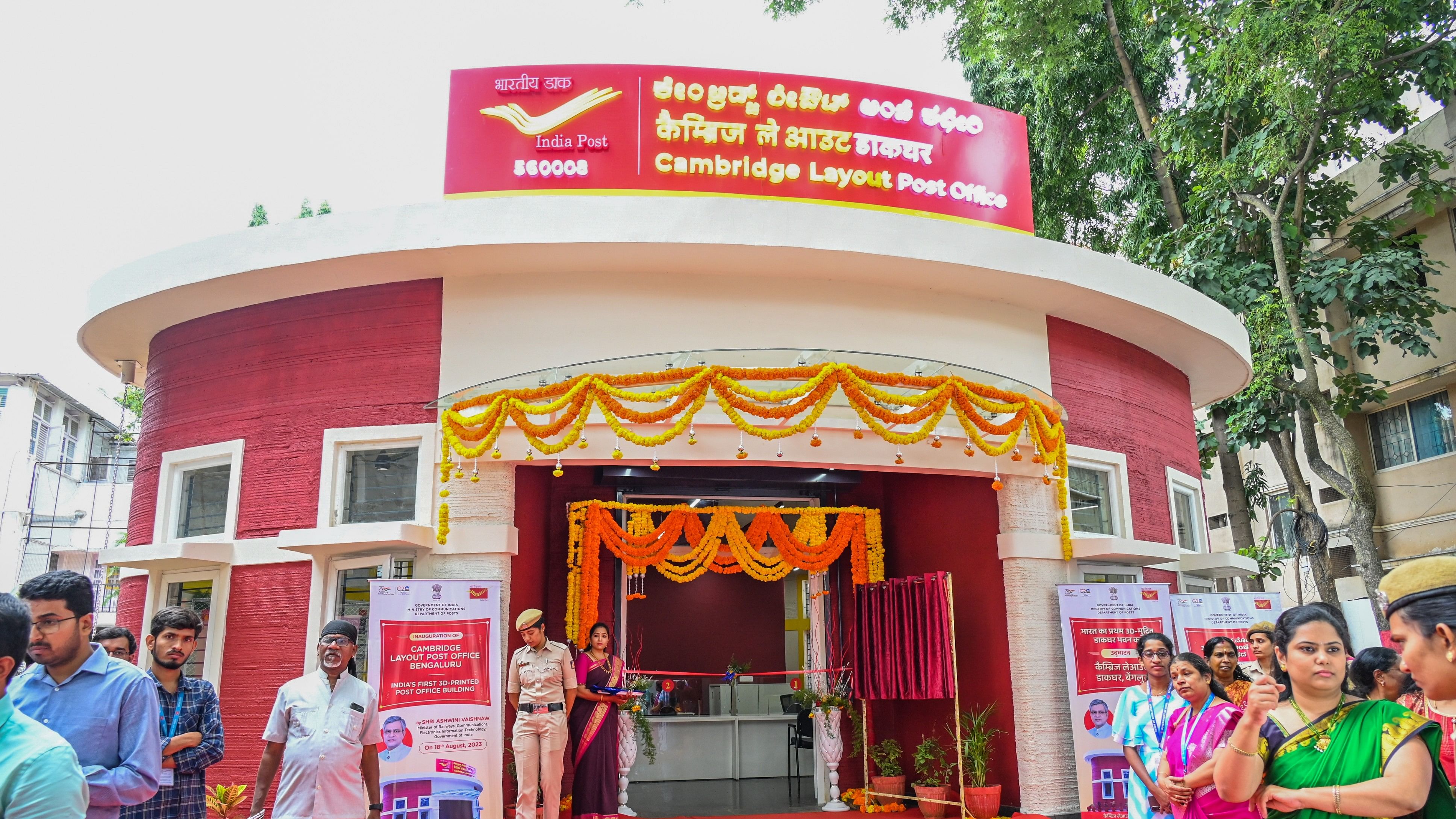 <div class="paragraphs"><p>The first 3D concrete Printed Post Office building is inaugurated at Cambridge Layout in Bengaluru on Friday, 18th August 2023. the construction of Cambridge Layout Post Office building was carried out through 3D concrete printing technology by a fully automated technology, wherein a robotic arm prints the concrete layer by layer as per the design, the entire construction completed in 45days.</p></div>