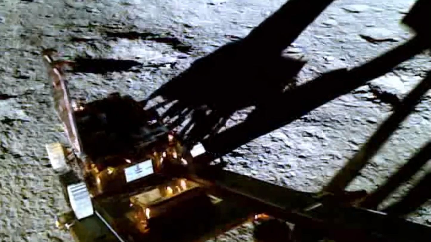 <div class="paragraphs"><p>Screengrab from video showing a view of the Pragyan rover descending to the lunar surface from the Vikram lander.</p></div>
