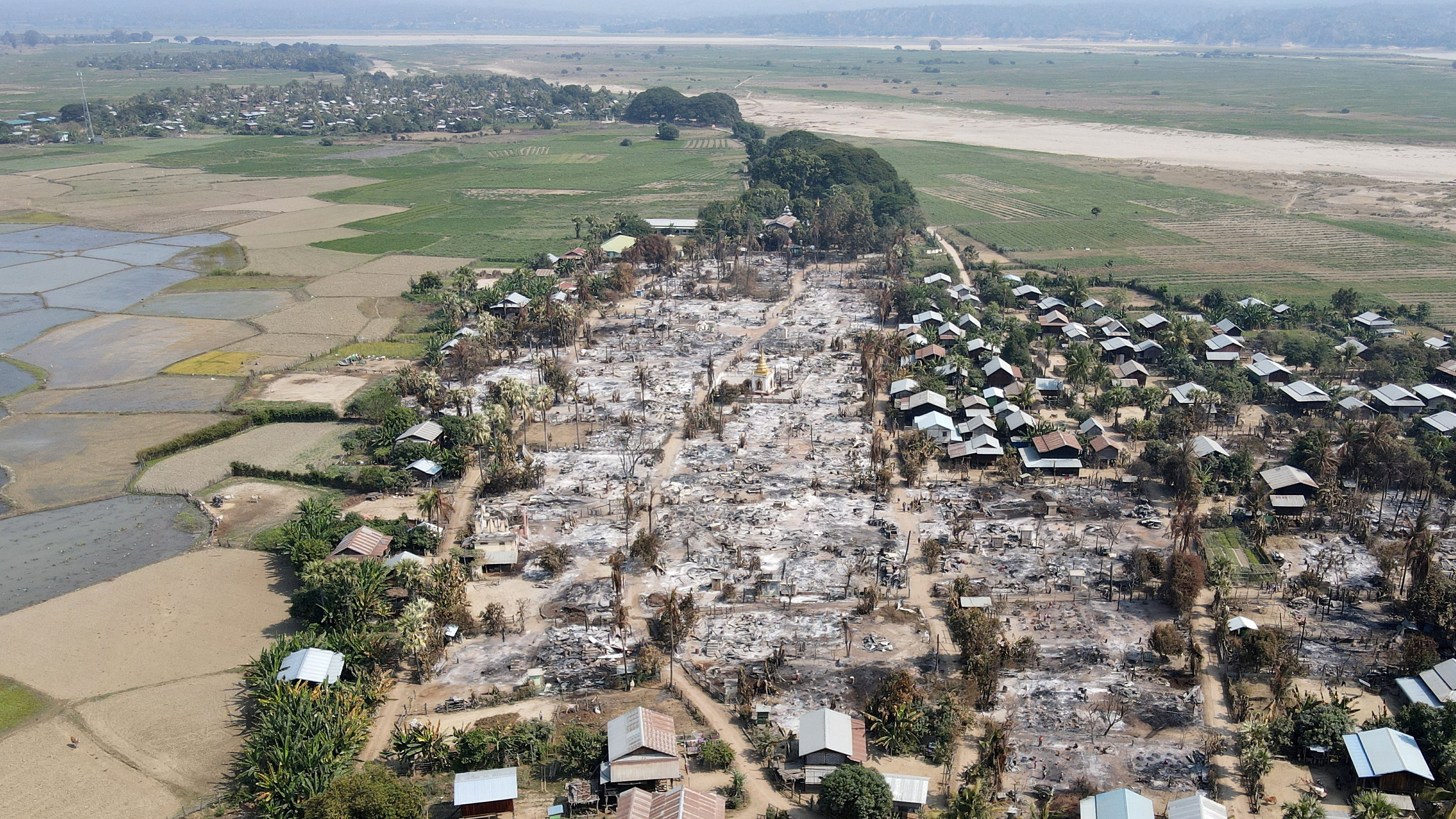 <div class="paragraphs"><p>An aerial view of Bin village of the Mingin Township in Sagaing region after villagers say it was set ablaze by the Myanmar military, in Myanmar February 3, 2022.</p></div>