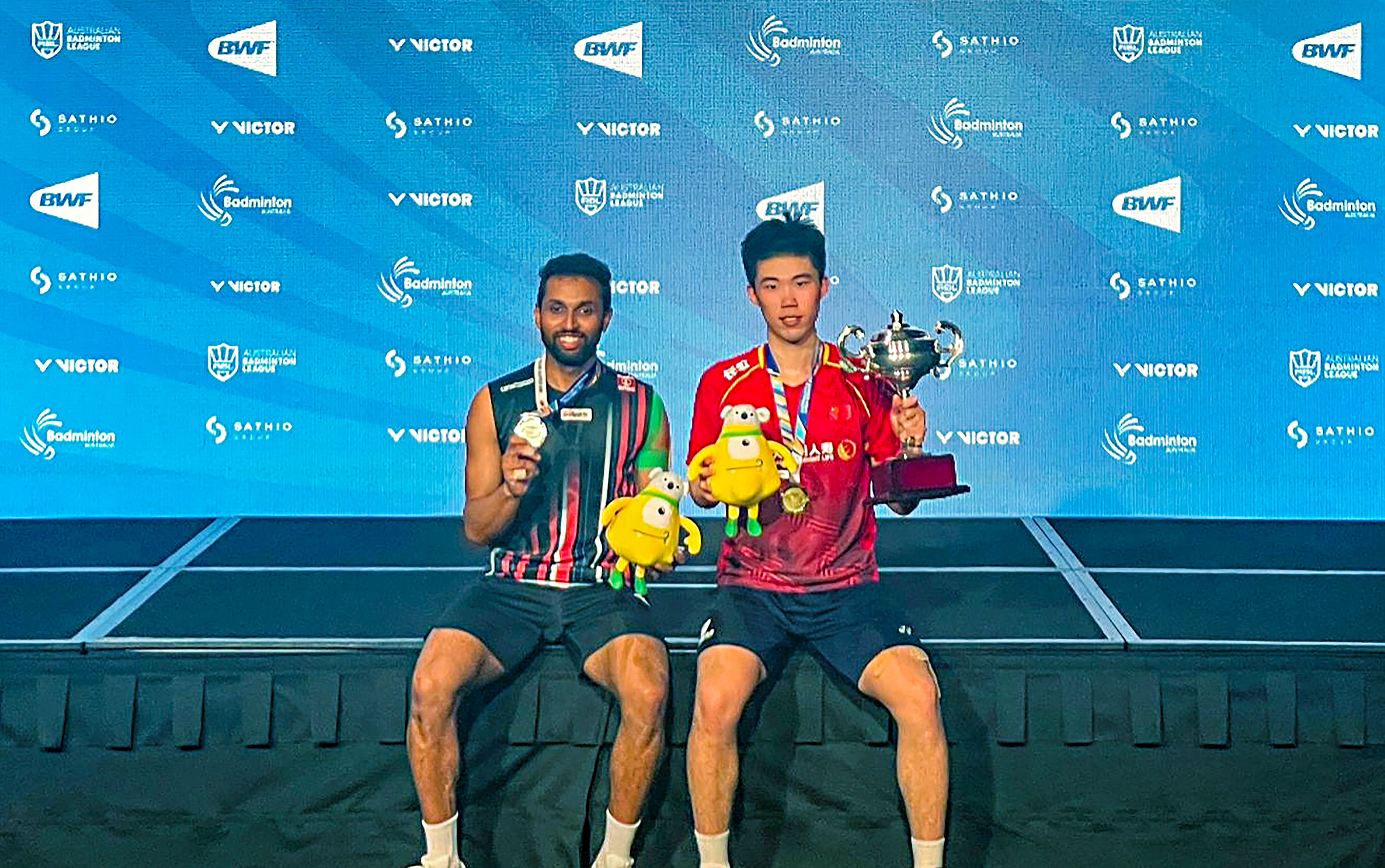 <div class="paragraphs"><p>India's badminton player HS Prannoy -Silver medal winner - with  China's Weng Hong Yang -Gold medalist - after the Australian Open men's singles final at the State Sports Centre in Sydney, Sunday, August 6, 2023. Prannoy lost the final match against China's Weng Hong Yang.</p></div>