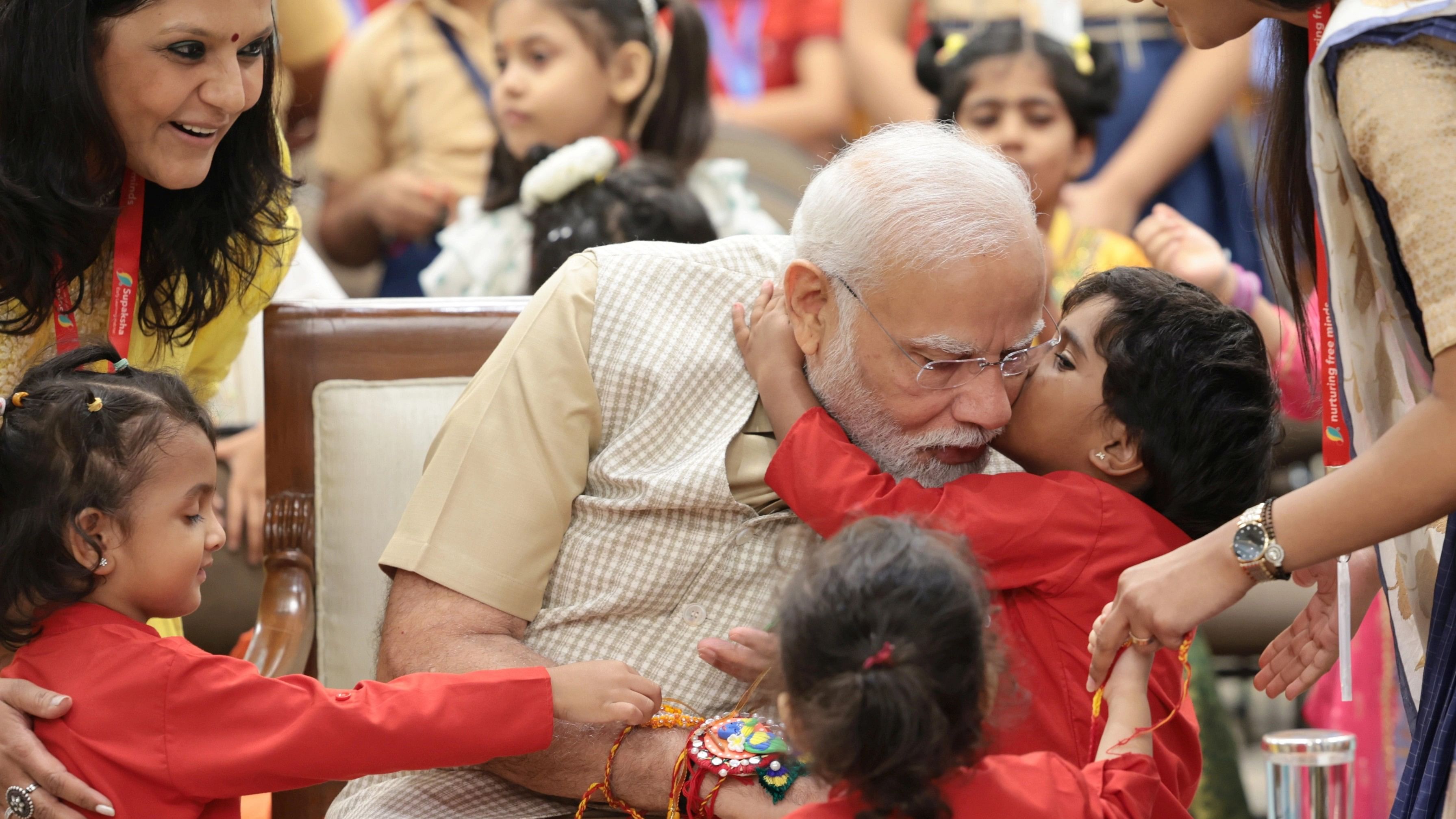 <div class="paragraphs"><p>PM Modi  celebrates&nbsp;Raksha Bandhan with kids.&nbsp;</p></div>