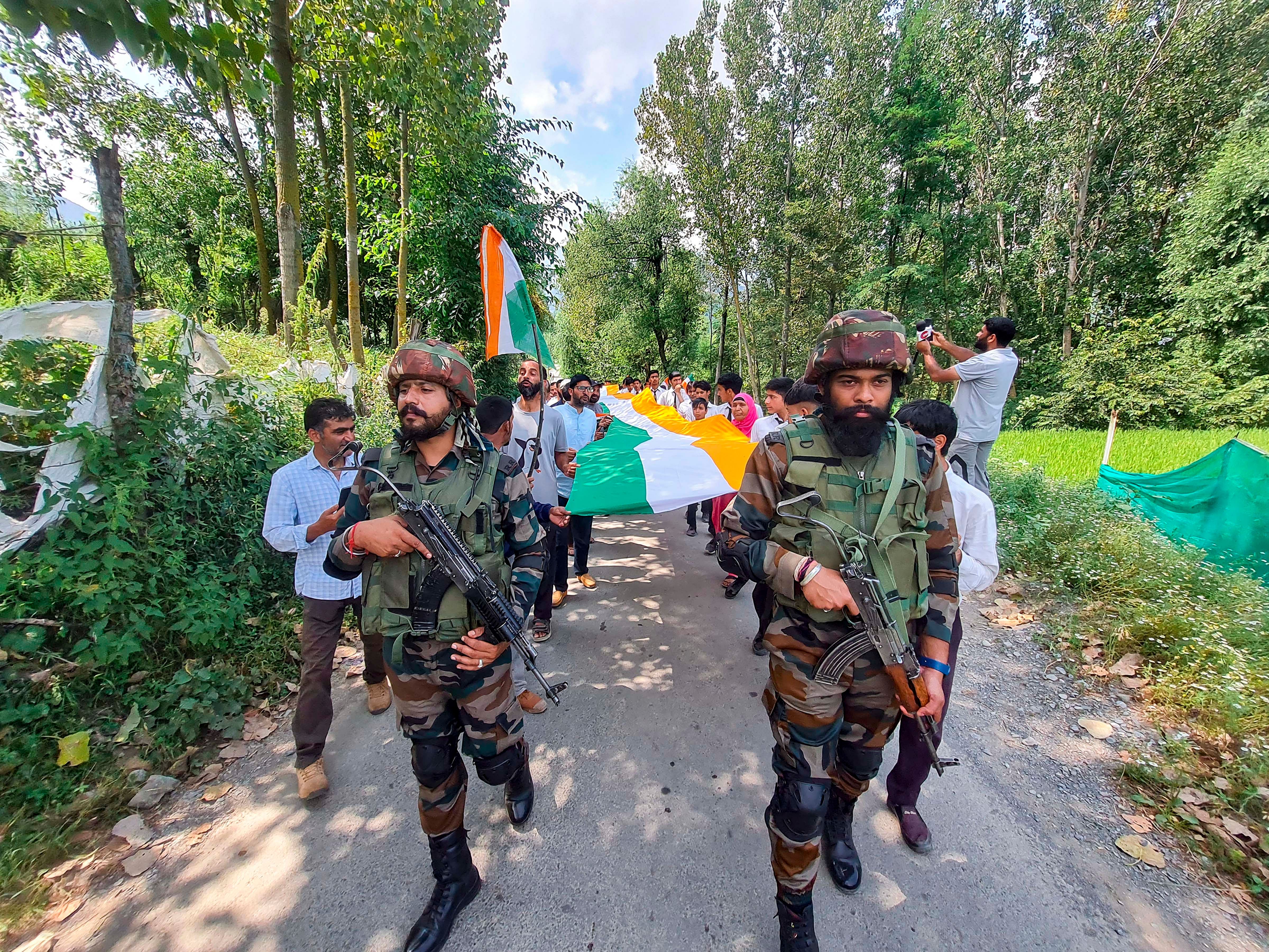 <div class="paragraphs"><p>Anantnag: Security personnel and locals during a 'Tiranga Rally' ahead of Independence Day, in Anantnag district, Friday, Aug. 11, 2023.</p></div>