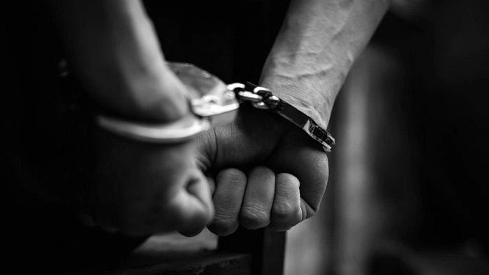 <div class="paragraphs"><p>Representative image of man in handcuffs.</p></div>