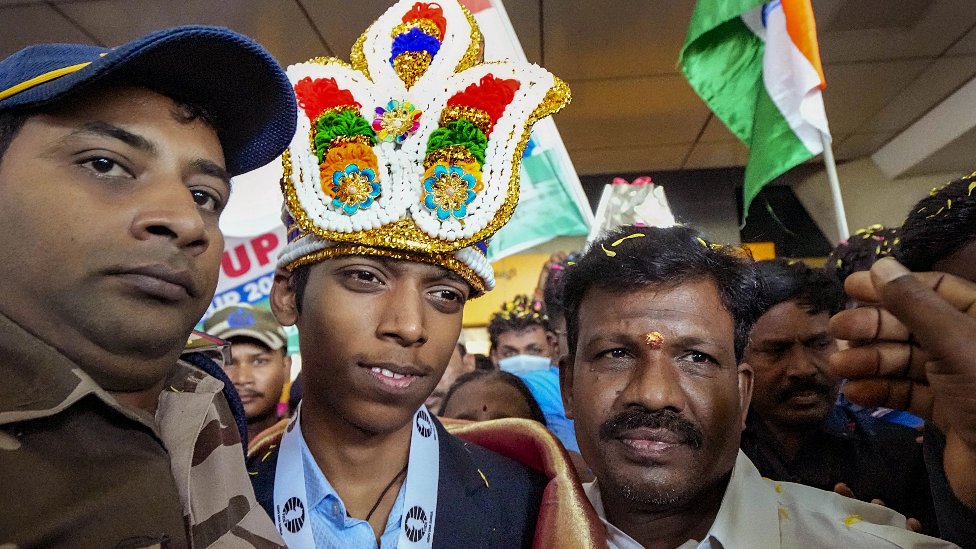 <div class="paragraphs"><p>Chess World Cup runner-up R Praggnanandhaa being welcomed upon his arrival, at Chennai International Airport, Wednesday, Aug 30, 2023.</p></div>