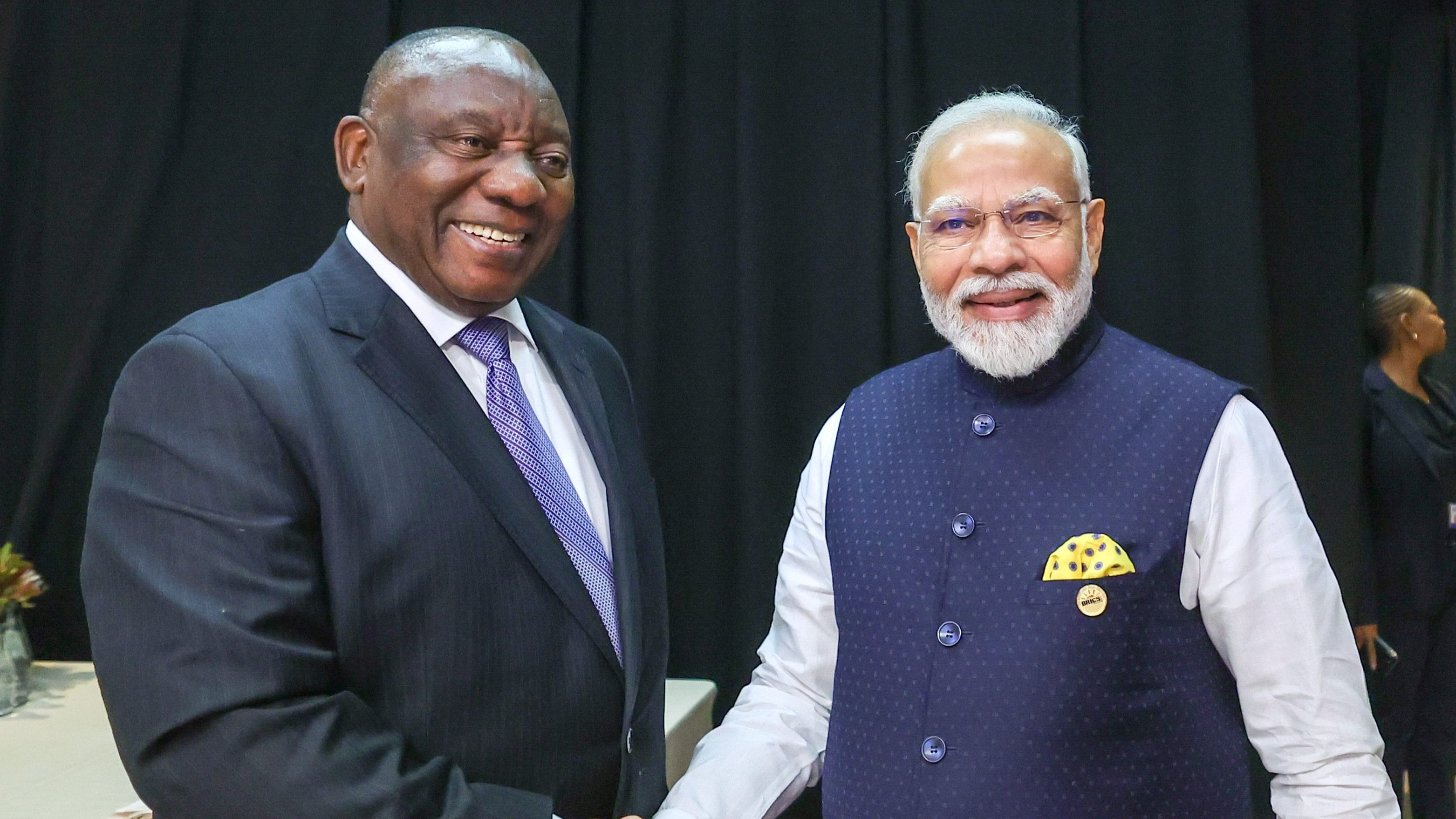 <div class="paragraphs"><p>Prime Minister Narendra Modi in a meeting with South African President Cyril Ramaphosa on the sidelines of the BRICS Summit, in Johannesburg, Wednesday, Aug. 23, 2023.</p></div>