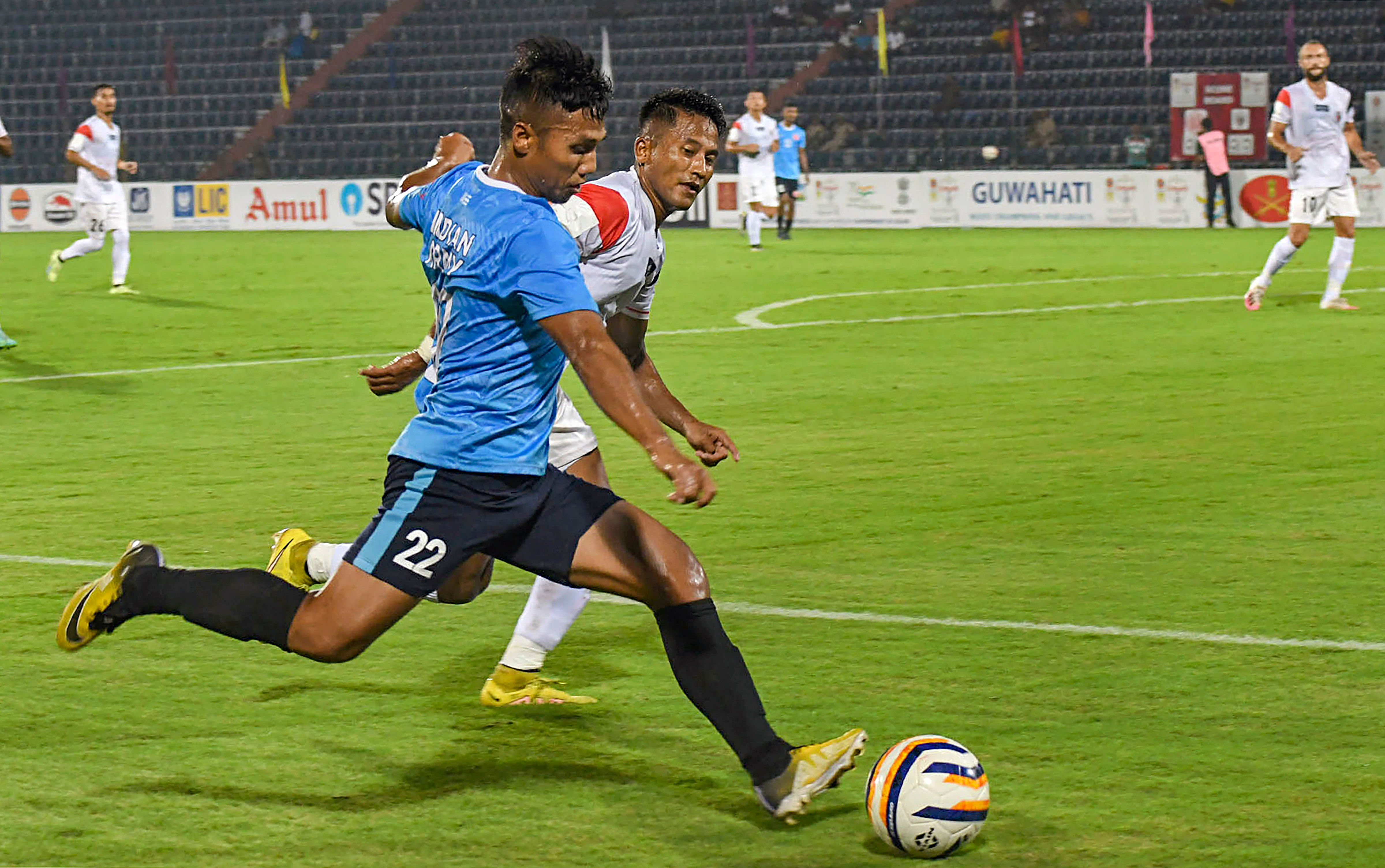 <div class="paragraphs"><p>Guwahati: Players of NorthEast United FC (white) and Army Football Team (blue) vie for the ball during the first quarter-final football match of the Durand Cup 2023, at Indira Gandhi Athletic Stadium, in Guwahati, Thursday, Aug. 24, 2023. </p></div>