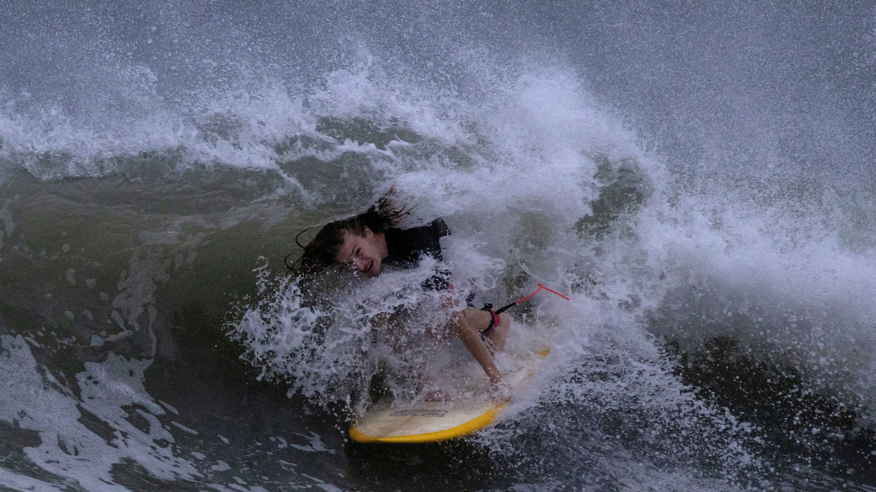<div class="paragraphs"><p>A surfer rides the swells ahead of Hurricane Idalia in Clearwater Beach, Florida.&nbsp;</p></div>