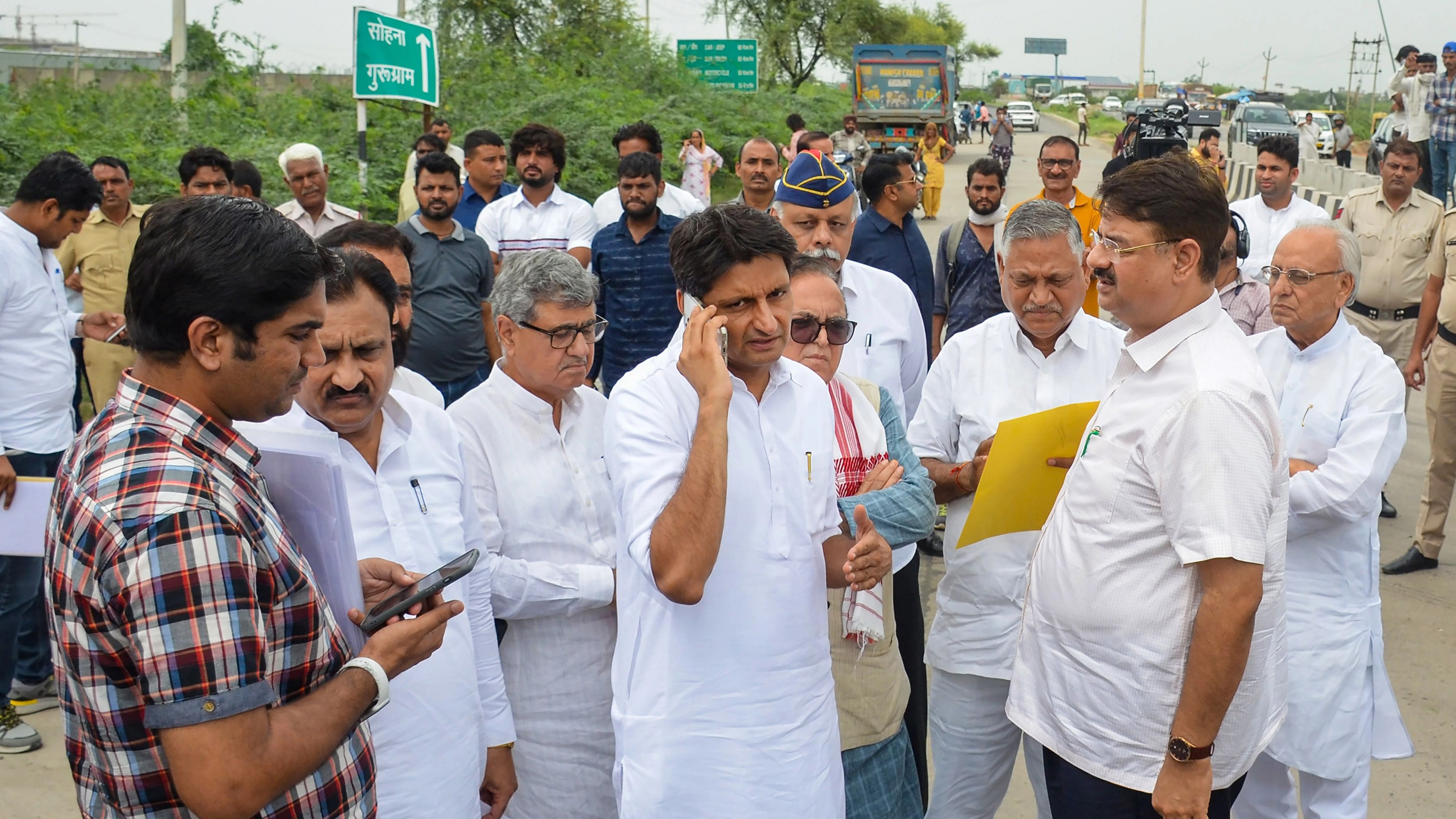 <div class="paragraphs"><p>Nuh: Congress MP Deepender Hooda and other senior Haryana Congress leaders after they were stopped at the Gurugram- Nuh border near KMP Expressway flyover, in Nuh district, on Tuesday, Aug. 8, 2023. The Congress delegation was on its way to visit Nuh district, where violence broke out a few days ago. </p></div>