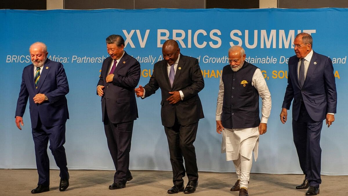 <div class="paragraphs"><p>Brazil's President Luiz Inacio Lula da Silva, China's President Xi Jinping, South African President Cyril Ramaphosa, Indian Prime Minister Narendra Modi and Russia's Foreign Minister Sergei Lavrov walk after posing for a picture at the BRICS Summit in Johannesburg, South Africa August 23, 2023.</p></div>