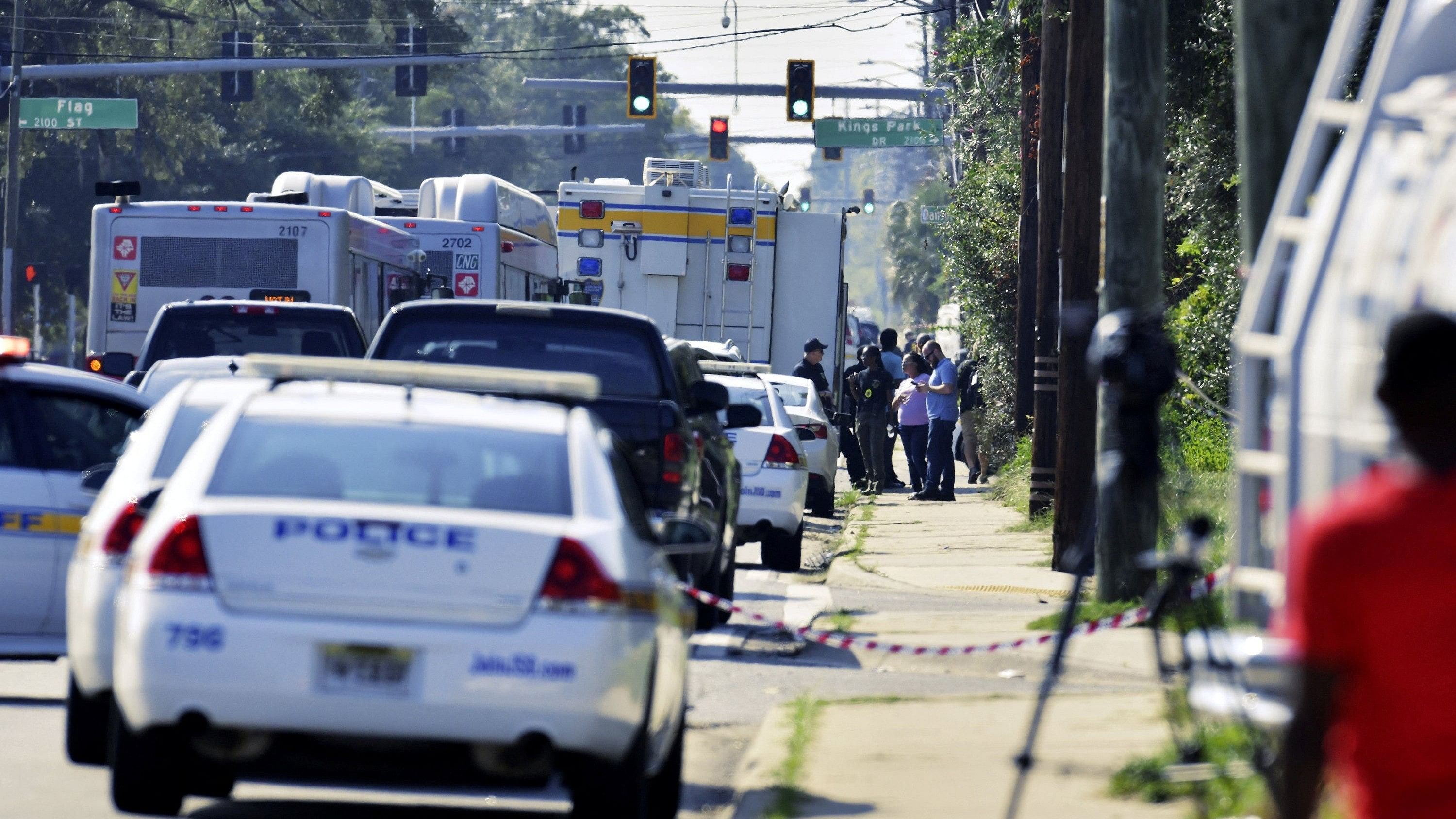 <div class="paragraphs"><p>Emergency personnel surround a Dollar General store after a white man armed with a high-powered rifle and a handgun killed three Black people before shooting himself, in what local law enforcement described as a racially motivated crime in Jacksonville, Florida.</p></div>