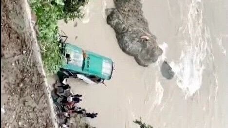 <div class="paragraphs"><p>The bus carrying pilgrims from Rajasthan overturned and fell some 50 metres down the road at a riverbank south of Churiamai.</p></div>
