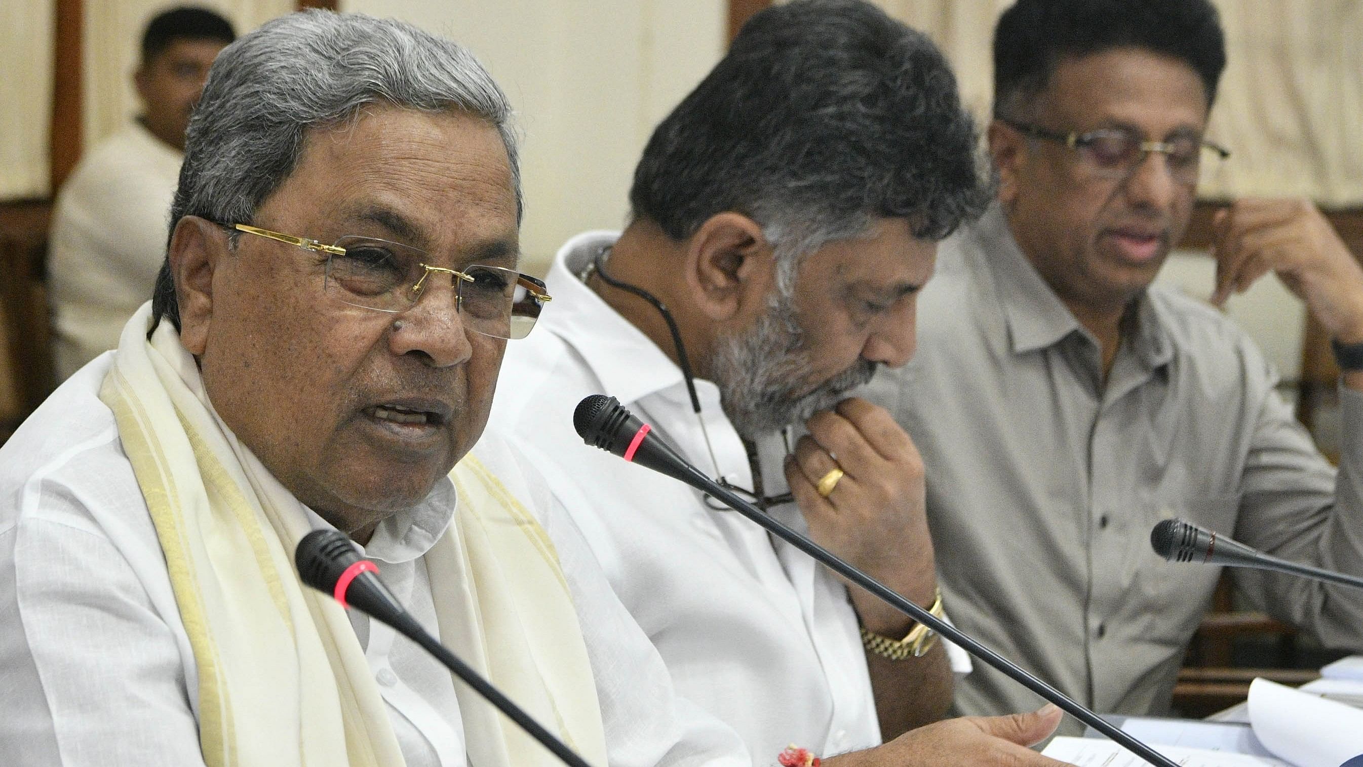 <div class="paragraphs"><p>Chief Minister Siddaramaiah, Deputy Chief Minister D K Shivakumar and Higher Education Minister M C Sudhakar at a meeting with vice-chancellors of universities and academics, in Bengaluru on Monday. </p></div>