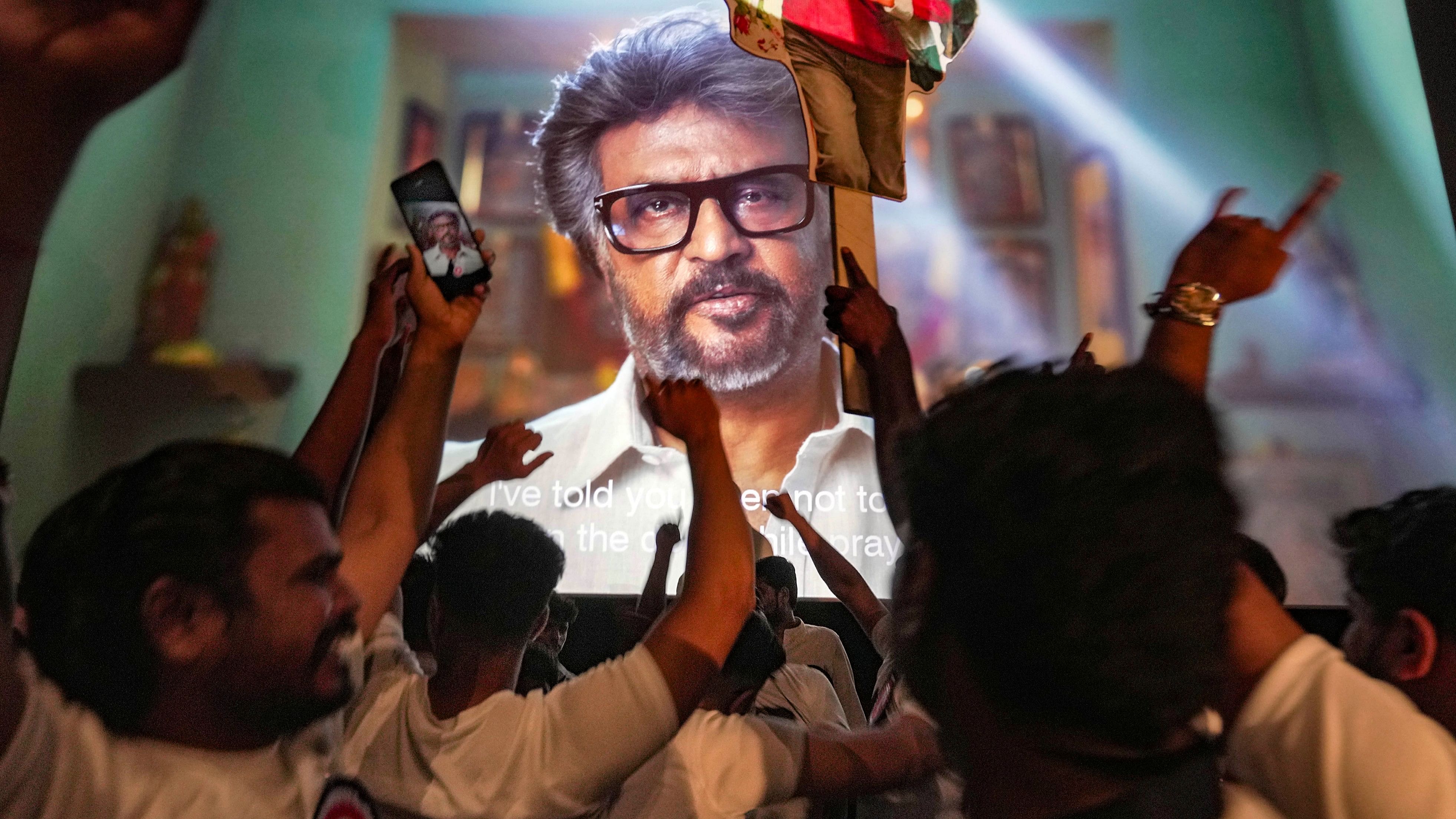 <div class="paragraphs"><p>Rajinikanth’s fans celebrate during a show of ‘Jailer’ at a theatre.</p></div>