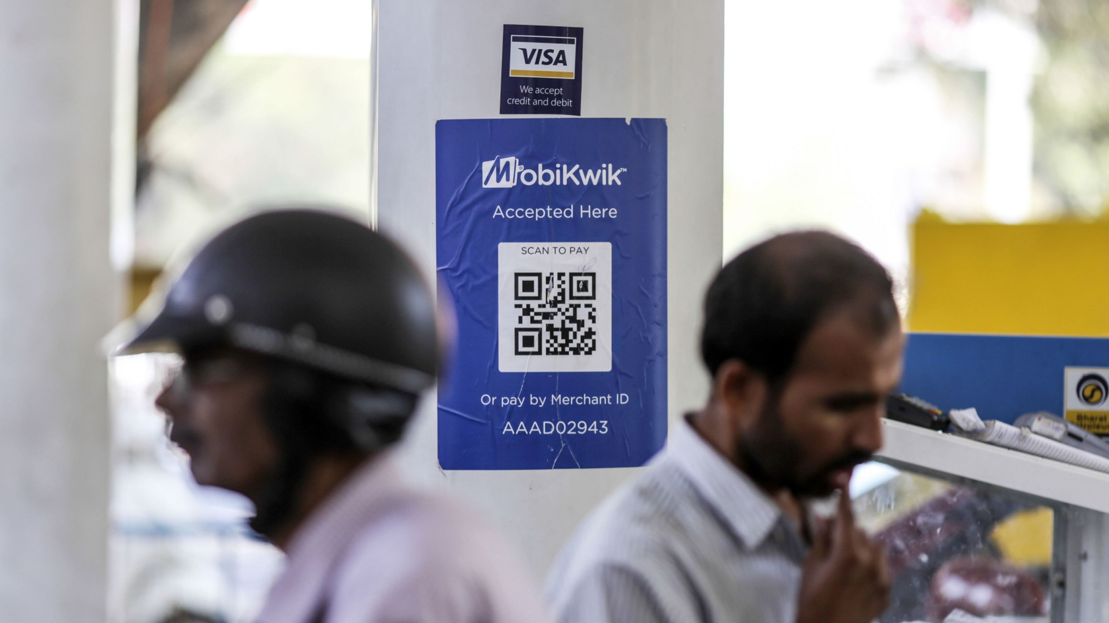 <div class="paragraphs"><p>Signage for digital payment service MobiKwik, operated by One MobiKwik Systems Pvt., is displayed at a Bharat Petroleum Corp. </p></div>