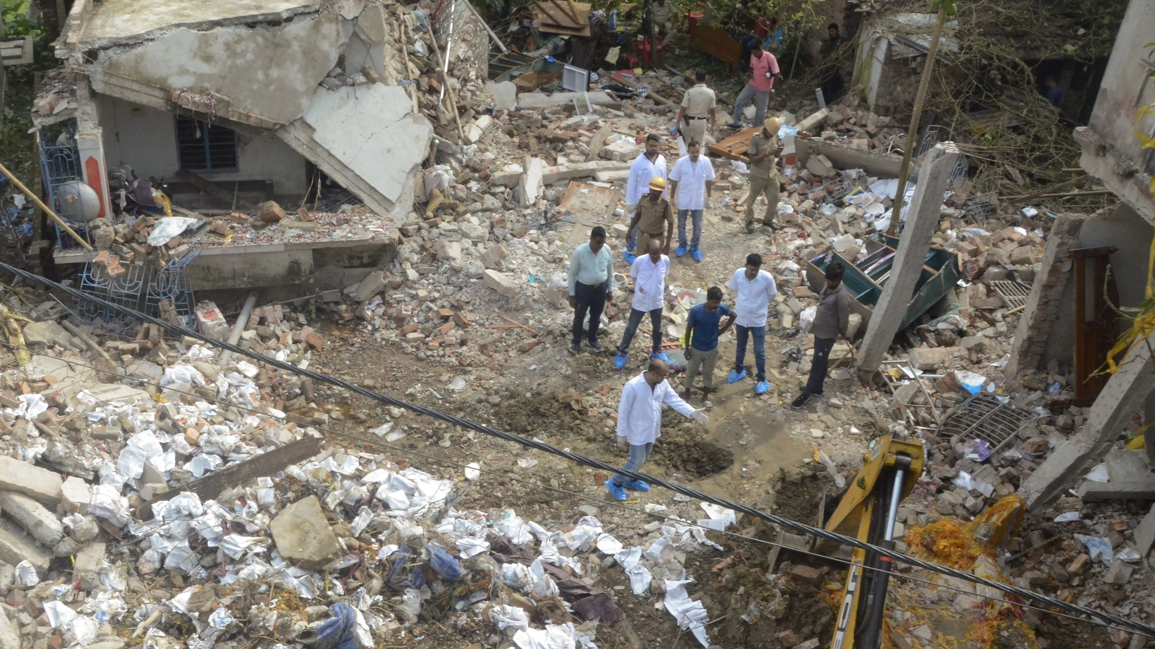 <div class="paragraphs"><p>North 24 Parganas: Forensic experts collect evidence from the blast site of an illegal  firecracker factory, in which at least eight people were killed and several others injured, at Barasat in North 24 Parganas district, Monday, Aug 28, 2023. </p></div>