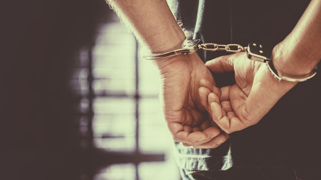 <div class="paragraphs"><p>Representative image of man in handcuffs.</p></div>