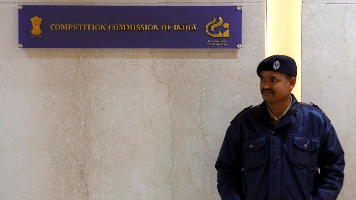 <div class="paragraphs"><p>A security guard stands outside the Competition Commission of India (CCI) headquarters in New Delhi.</p></div>