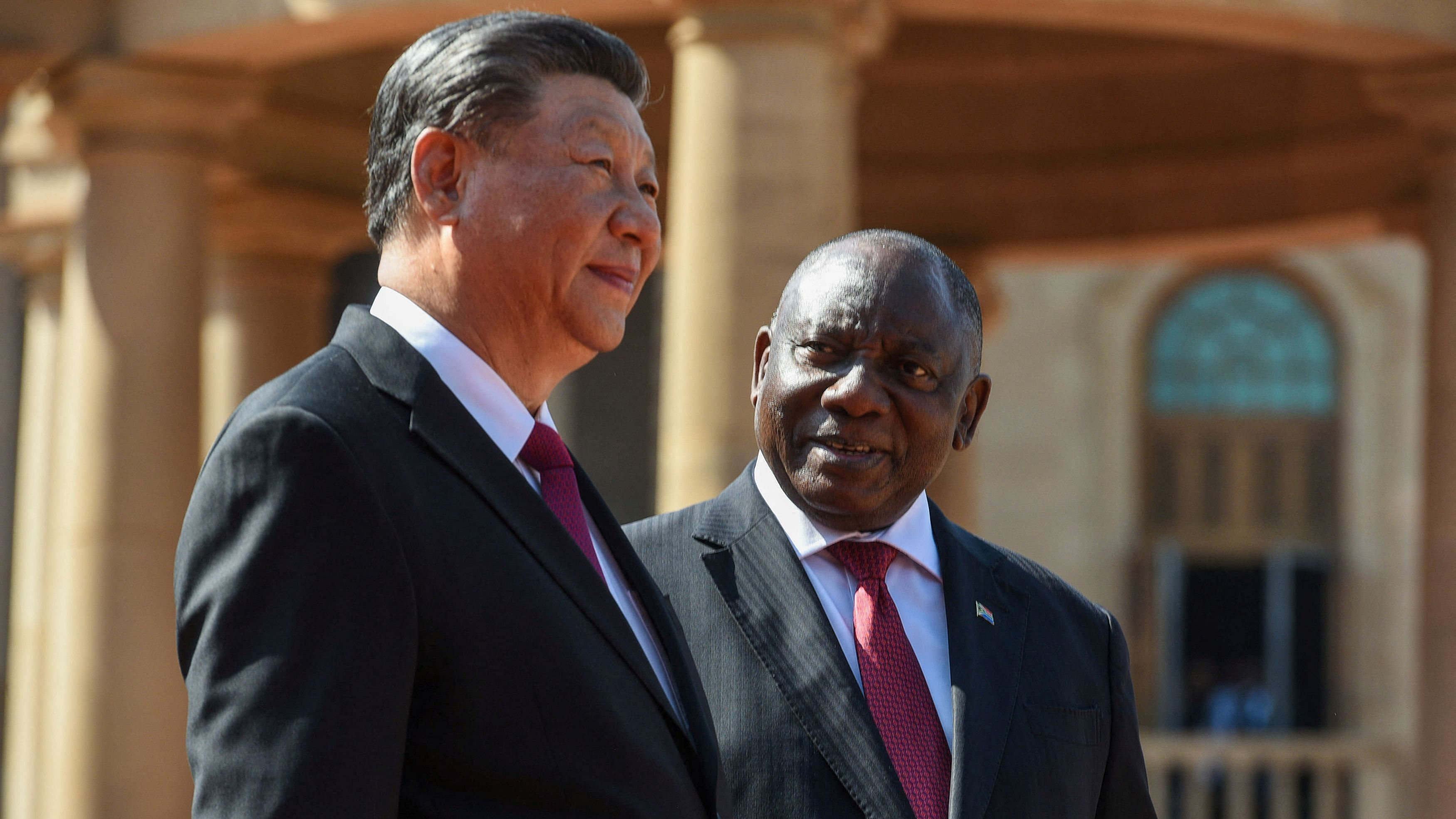 <div class="paragraphs"><p>South Africa's President Cyril Ramaphosa welcomes China's President Xi Jinping at the Union Buildings ahead of the opening remarks of the BRICS emerging economies meeting, in Pretoria, South Africa.&nbsp;</p></div>